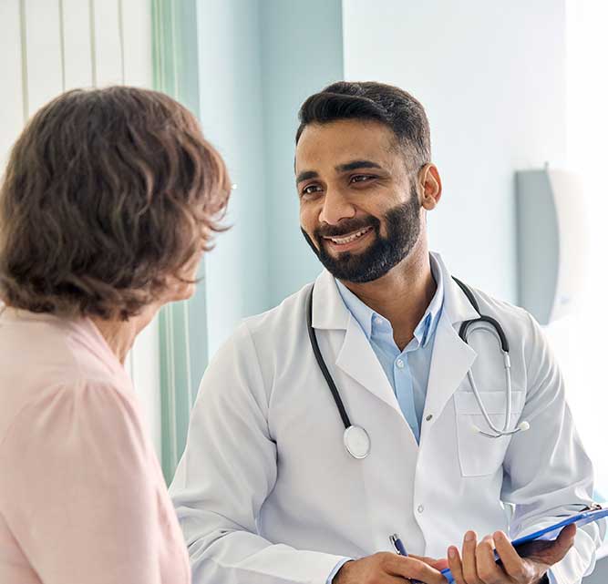 Healthcare provider consulting with a patient